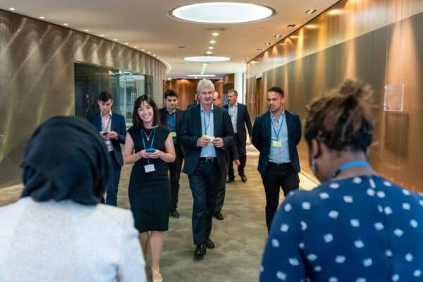 People meeting in a corridor